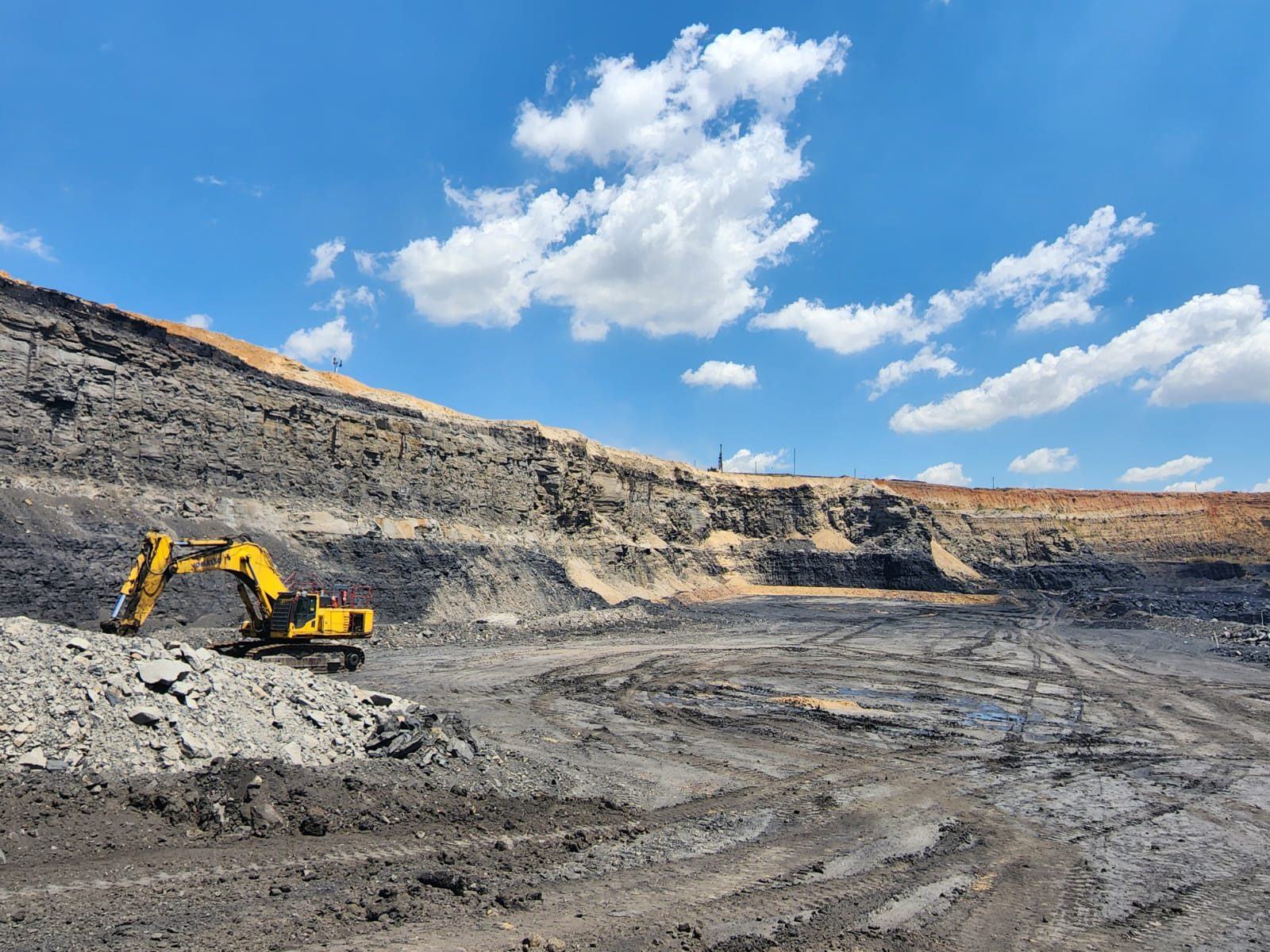 Excavator in an open cast pit